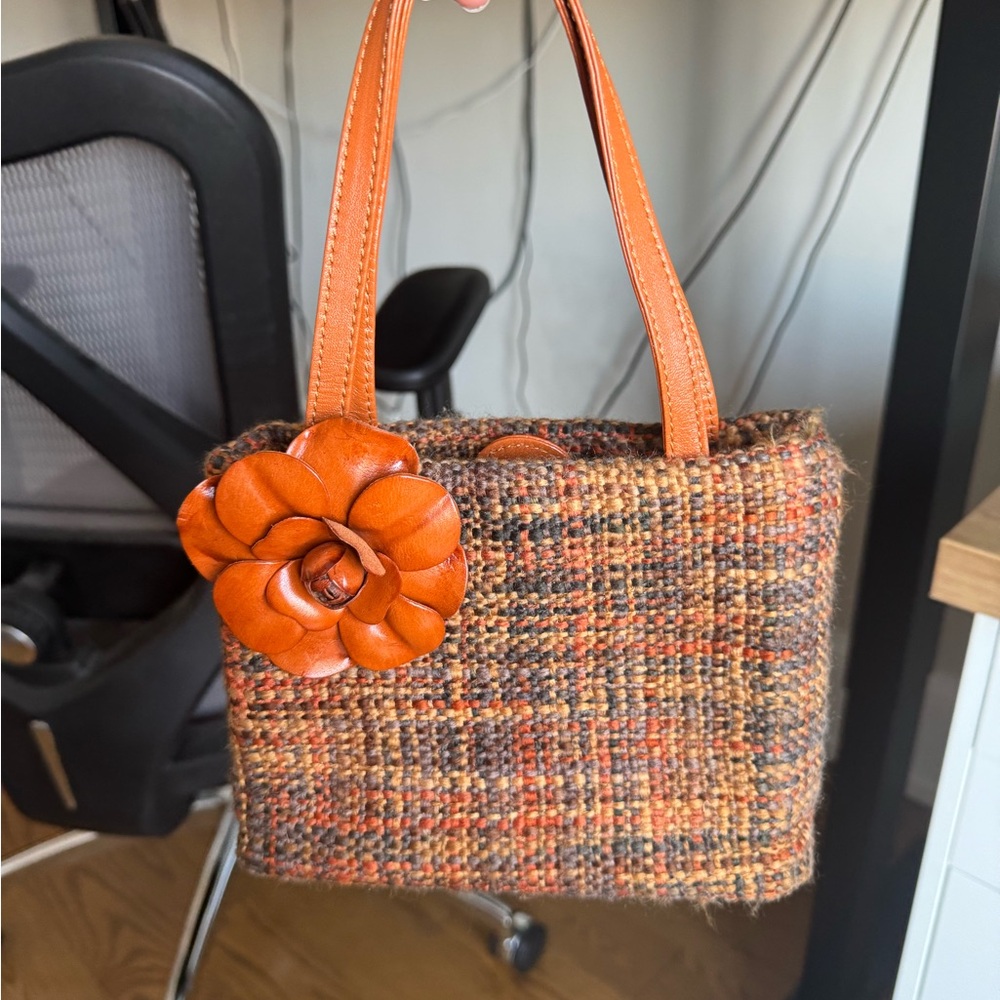 Stylish Orange Tweed Handbag with Flower Accent
